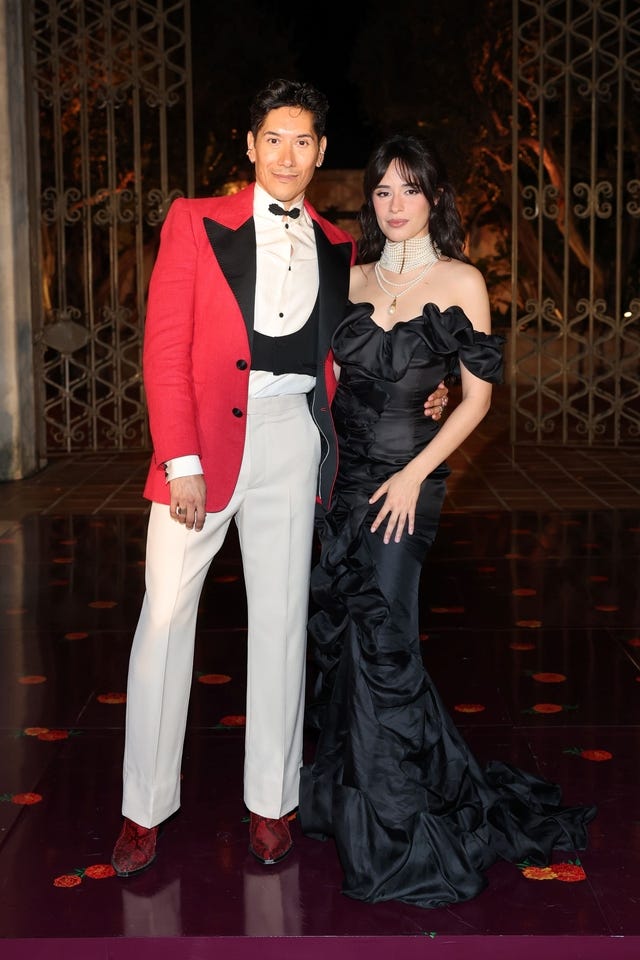 Carlos Eric Lopez and Camilla Cabello